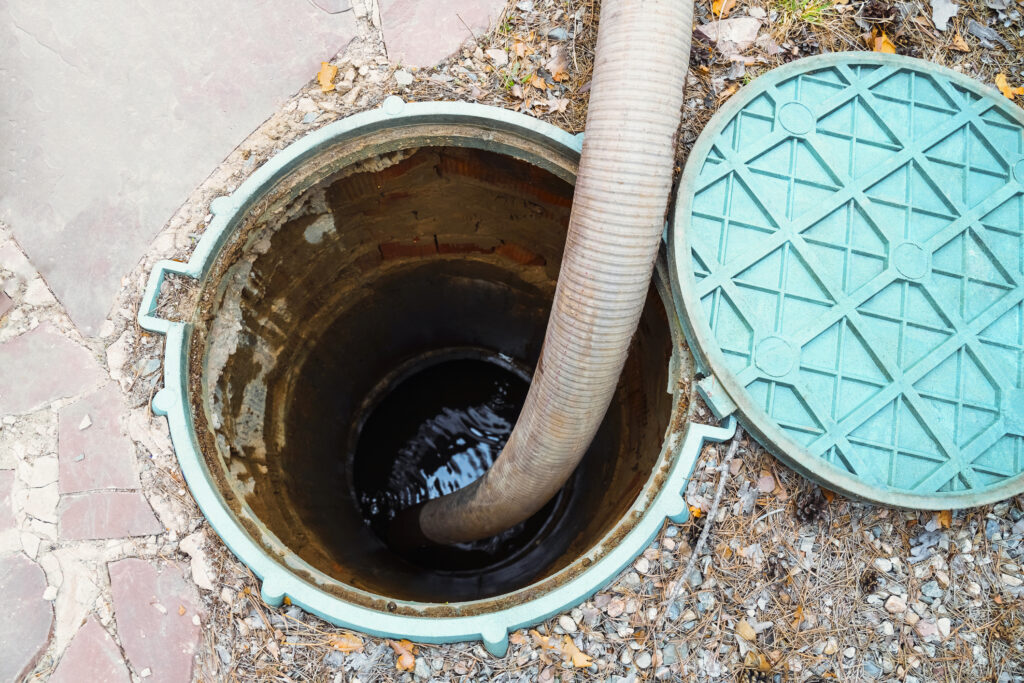 A septic tank being pumped out for regular maintenance